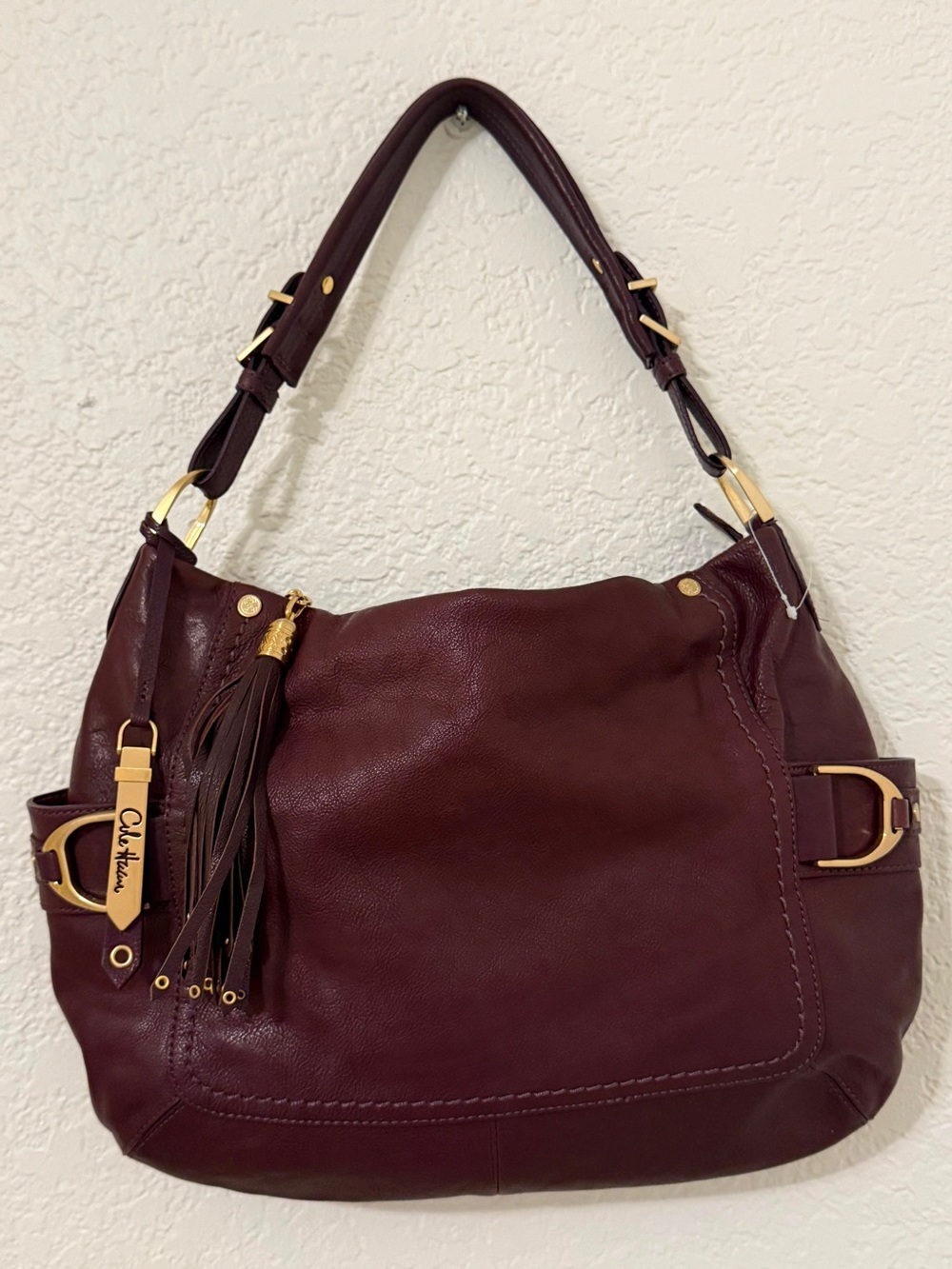 Cole Haan Burgundy Leather Shoulder Bag Hobo Purse Tassel Gold Hardware